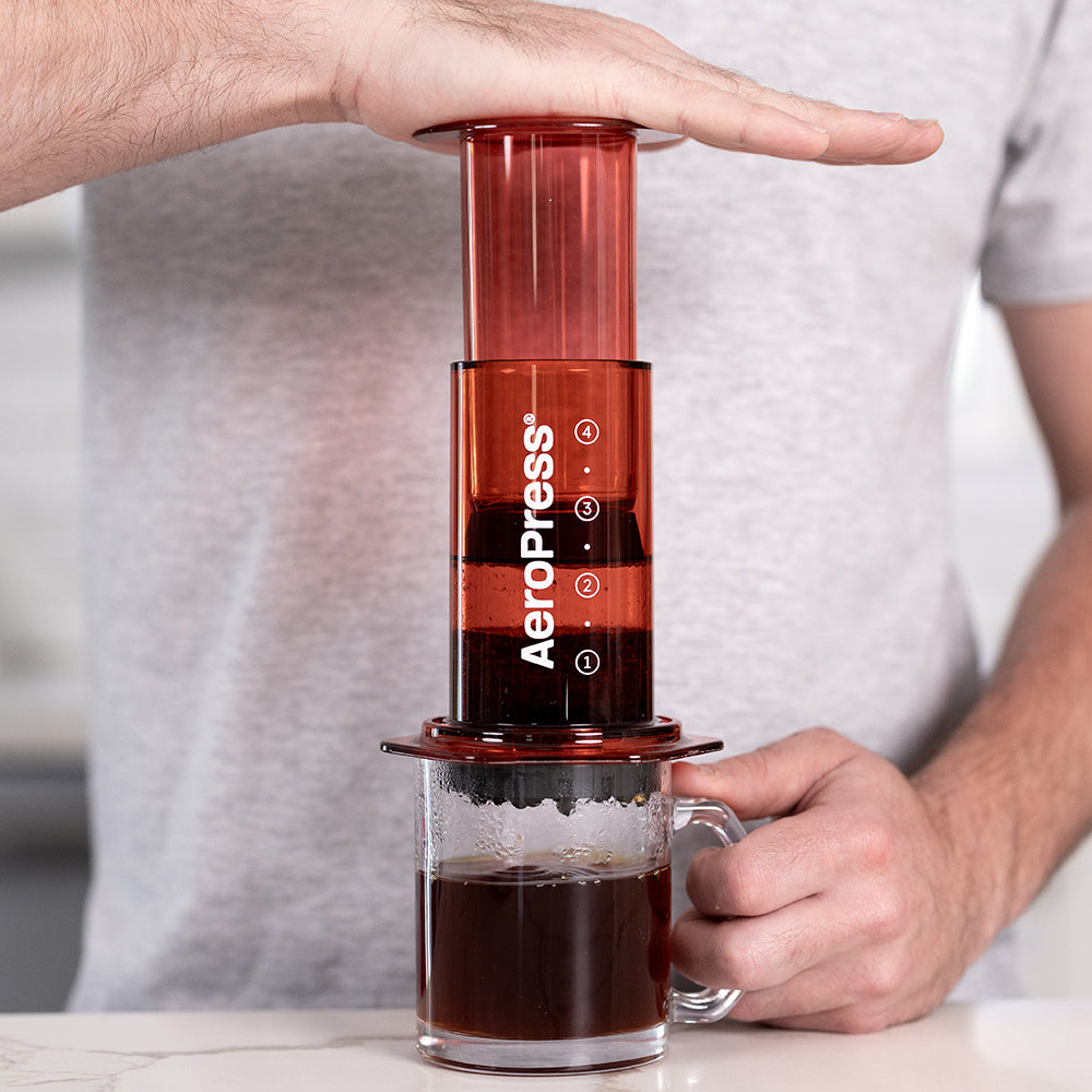 AeroPress Clear Coffee Maker (Red) - Amici Coffee Store