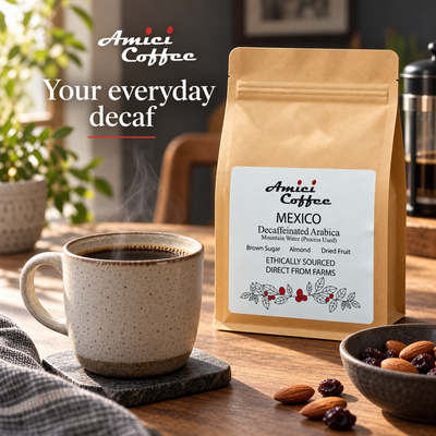 Amici Decaffeinated Arabica coffee bag on a kitchen counter with a brewed cup