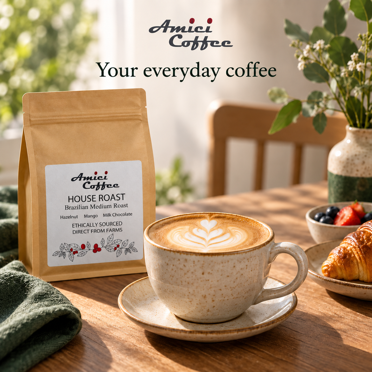 Amici House Roast coffee with latte art served with breakfast pastries